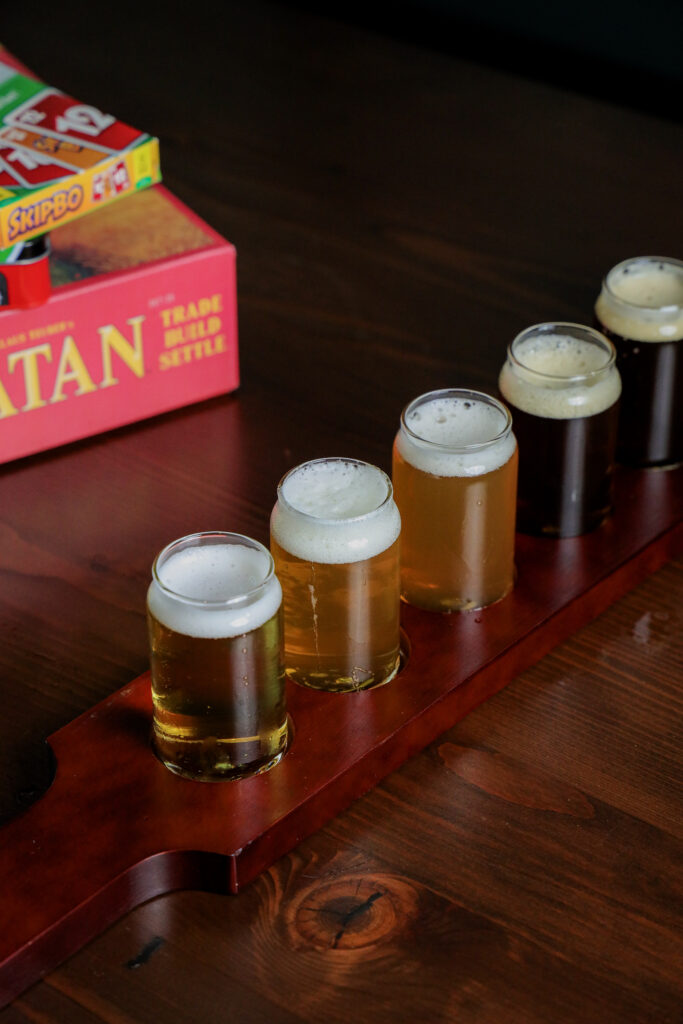 A flight includes six craft beers from SLU BRU in Seattle's South Lake Union, showcasing a variety of styles.